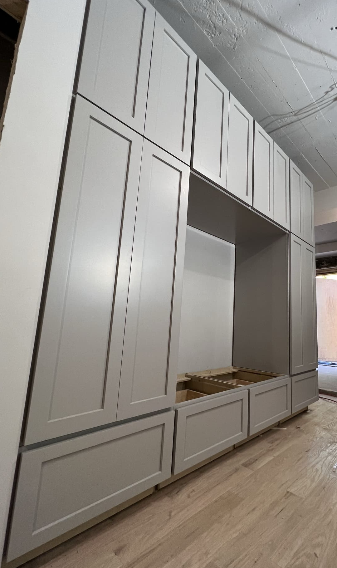 Floor-to-ceiling shaker built-in cabinetry